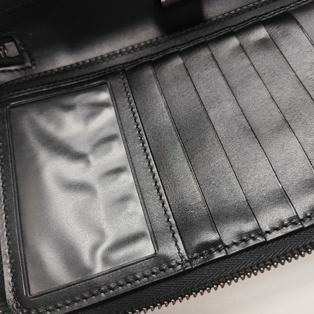 Monogram Coated Canvas Clutch Black