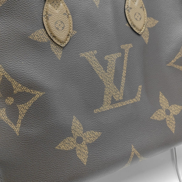 ONTHEGO MM Monogram Coated Canvas Brown
