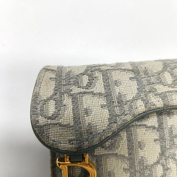 Authenticated pre-owned  Saddle Oblique Fabric Gray Card Holder - Card Holder at Looply