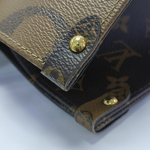 ONTHEGO MM Monogram Coated Canvas Brown