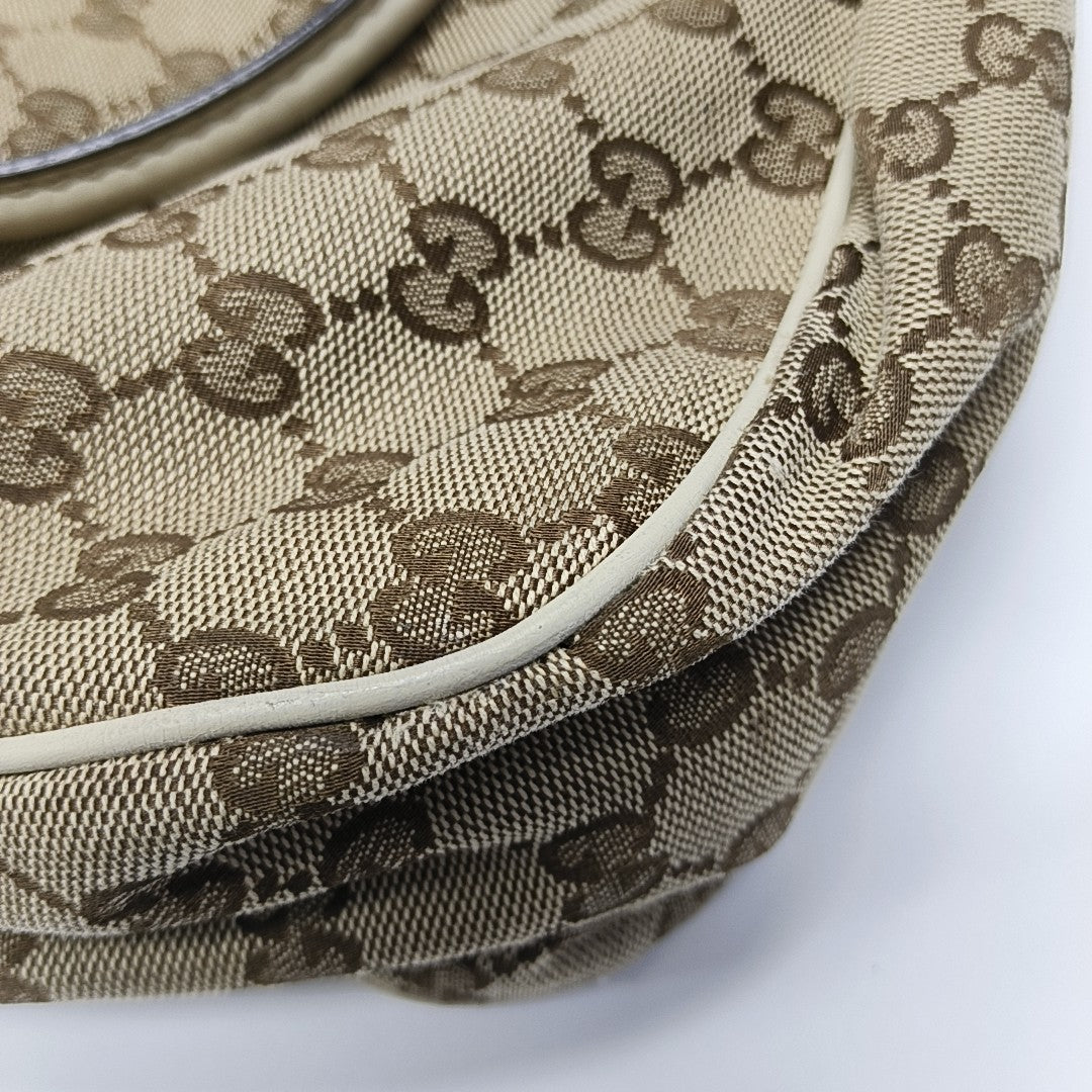 Sukey Monogram Canvas Brown
