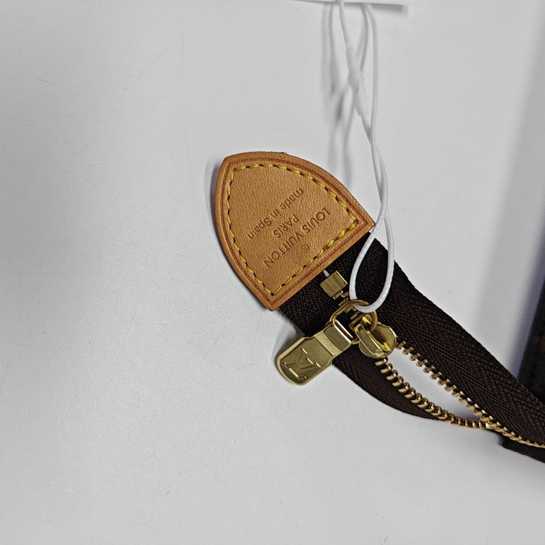 TOILET POCKET Monogram Coated Canvas Brown