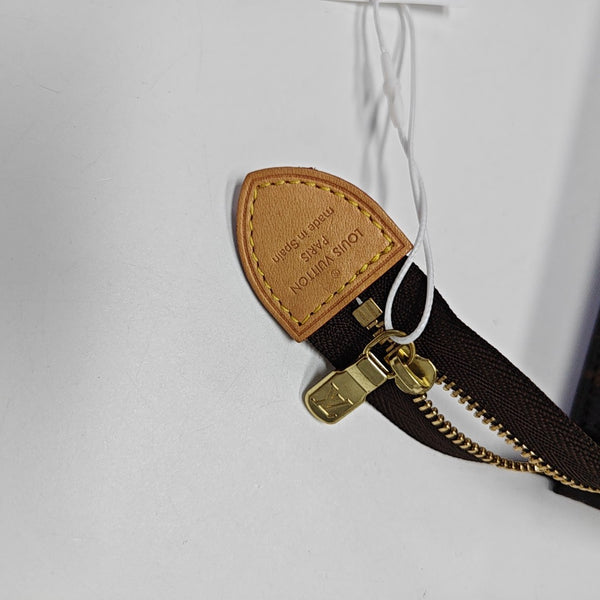 TOILET POCKET Monogram Coated Canvas Brown
