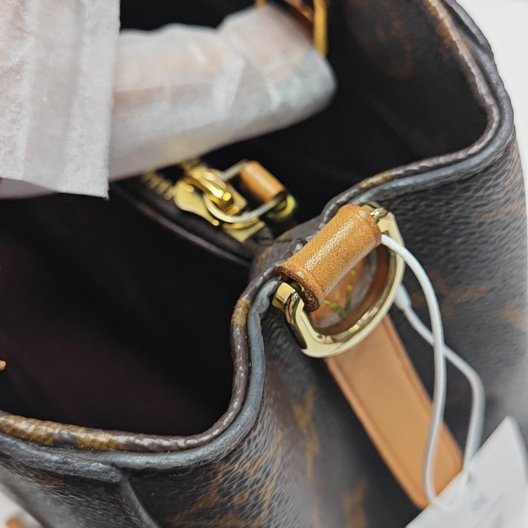 MONTAIGNE BB Monogram Coated Canvas Brown