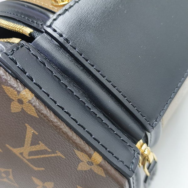 CANNES PM Monogram Coated Canvas Brown