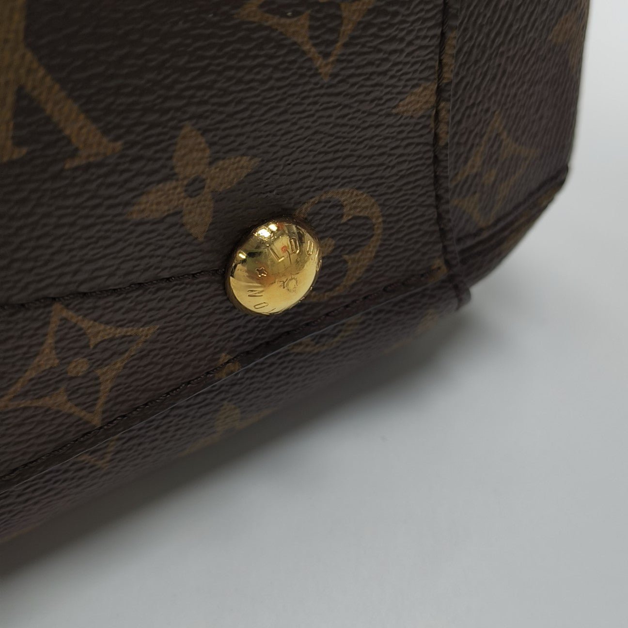 MONTAIGNE Monogram Coated Canvas Brown