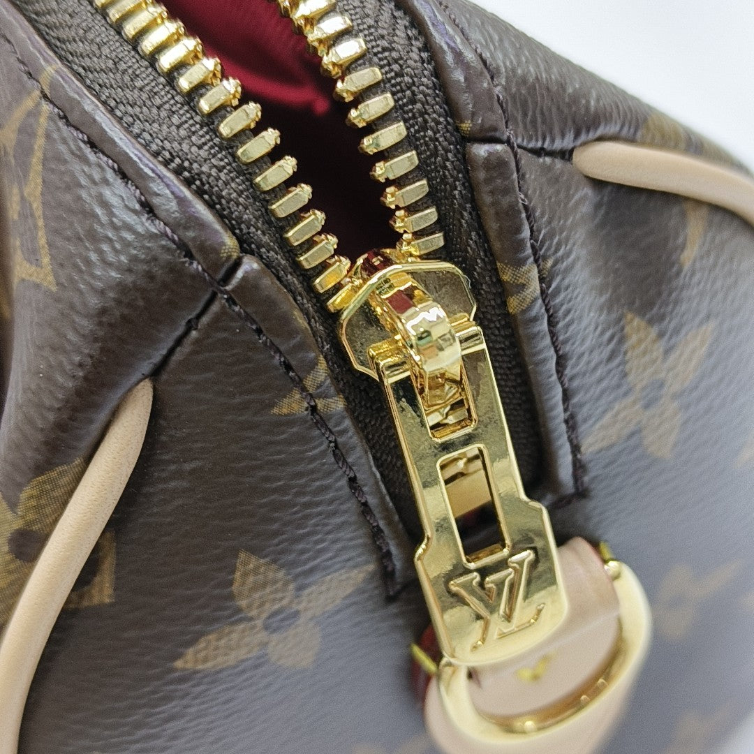 SPEEDY 20 Monogram Coated Canvas Brown