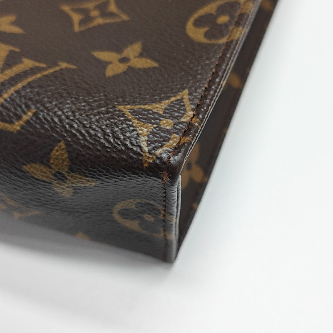 TOILET POCKET 26 Monogram Coated Canvas Brown
