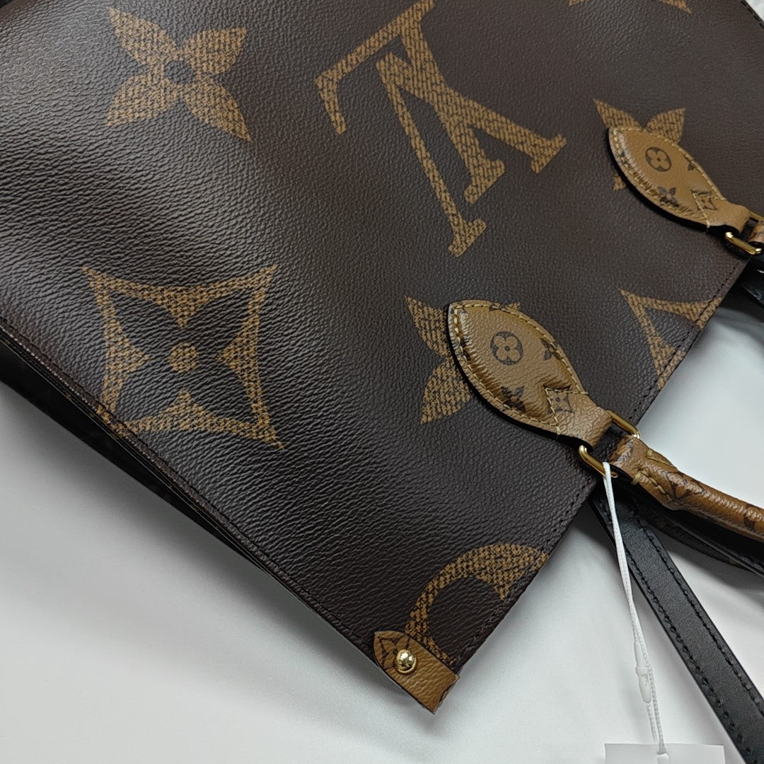 ONTHEGO MM Monogram Coated Canvas Brown