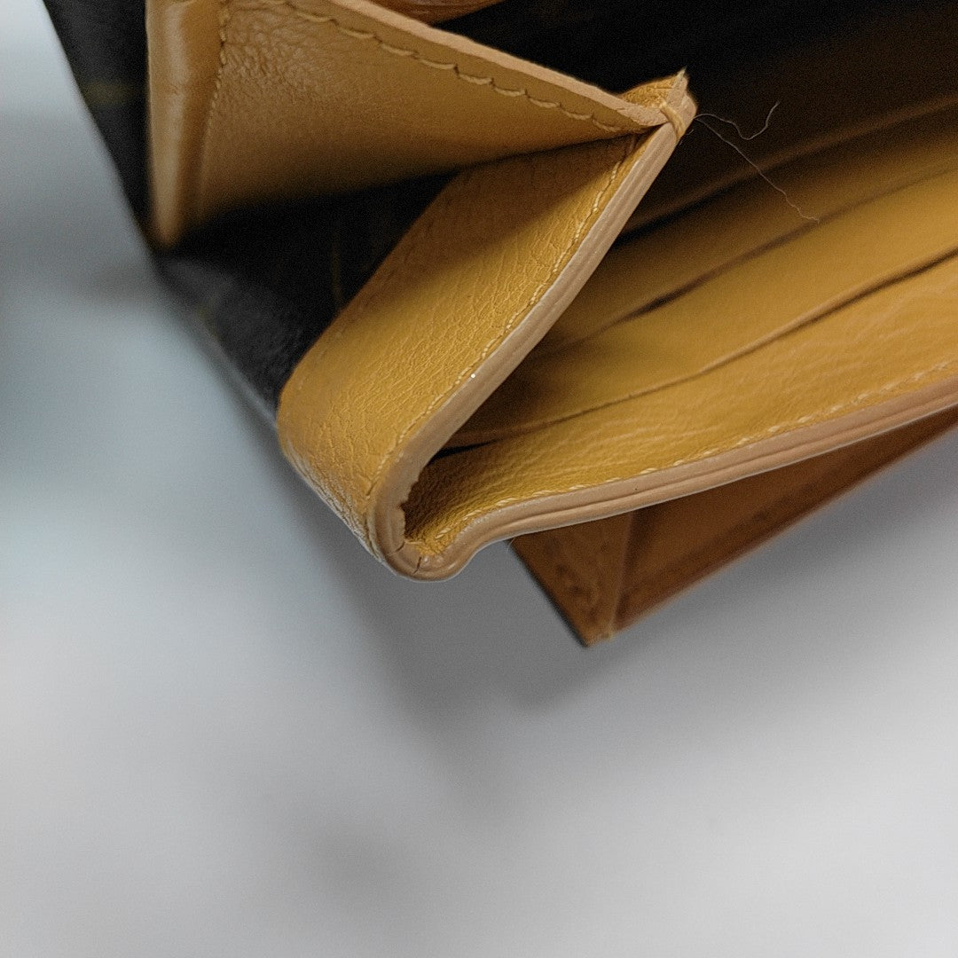 ELYSEE Monogram Coated Canvas Brown