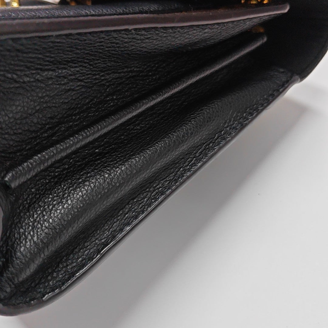 VICTOIRE Monogram Coated Canvas Brown