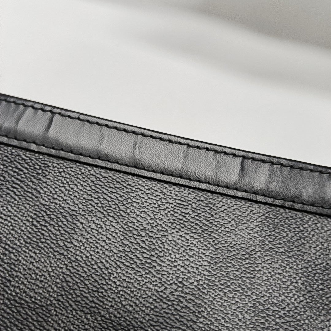 Pochette Voyag MM Damier Graphite Coated Canvas Gray