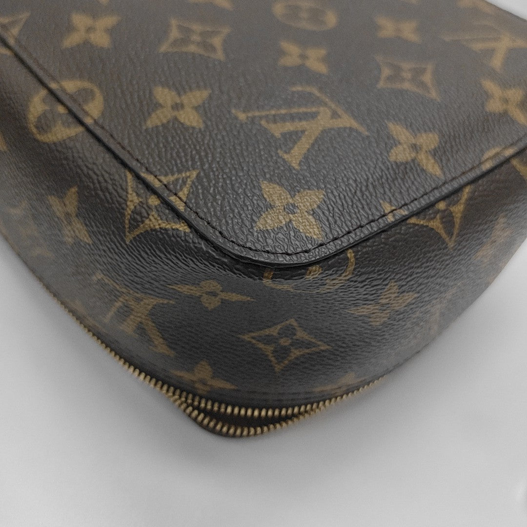 Monogram Coated Canvas Clutch Brown