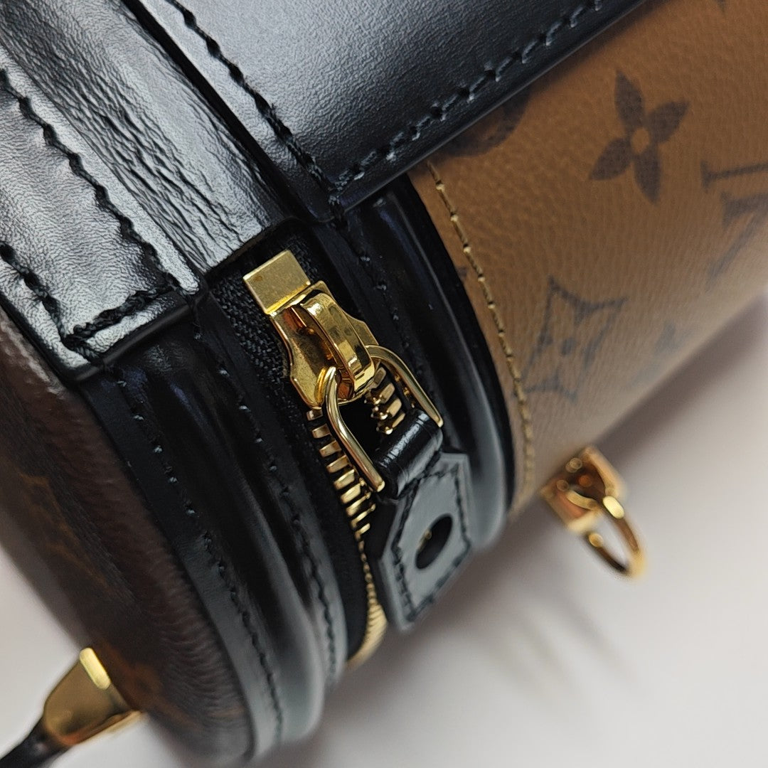 CANNES PM Monogram Coated Canvas Brown