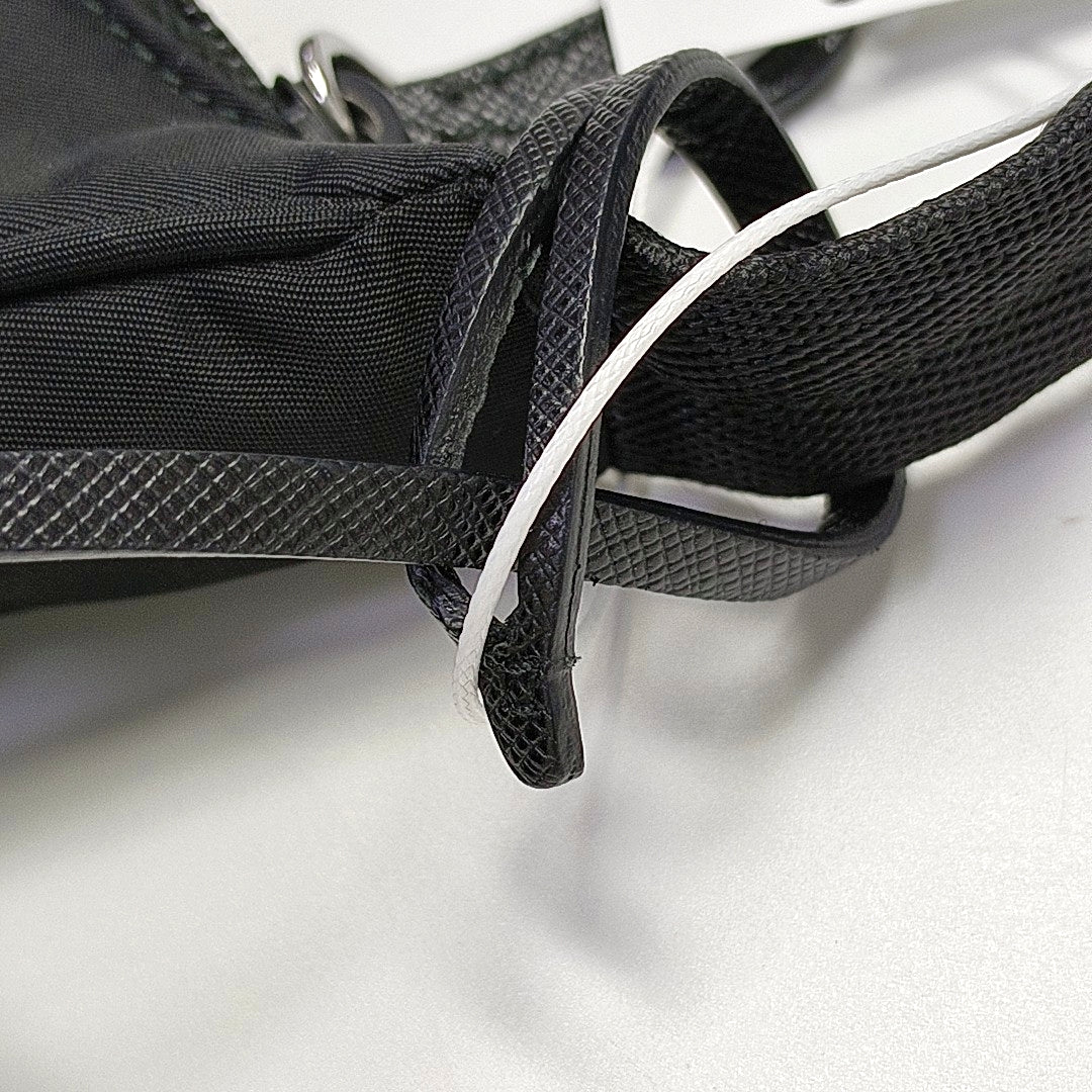 Authenticated pre-owned  Re-Edition2000 Mini Nylon Black - Top Handle Bag at Looply