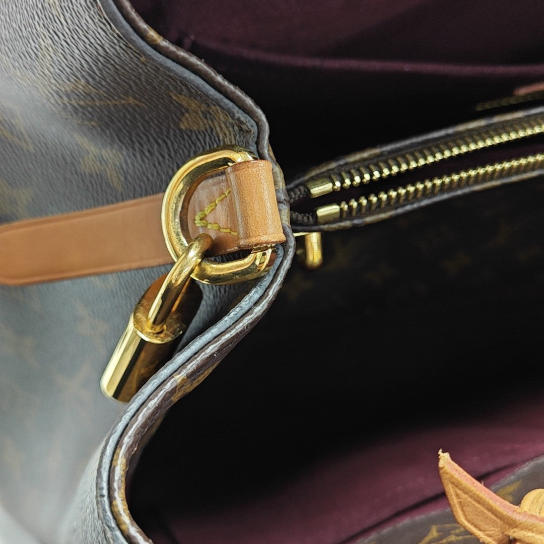 MONTAIGNE GM Monogram Coated Canvas Brown