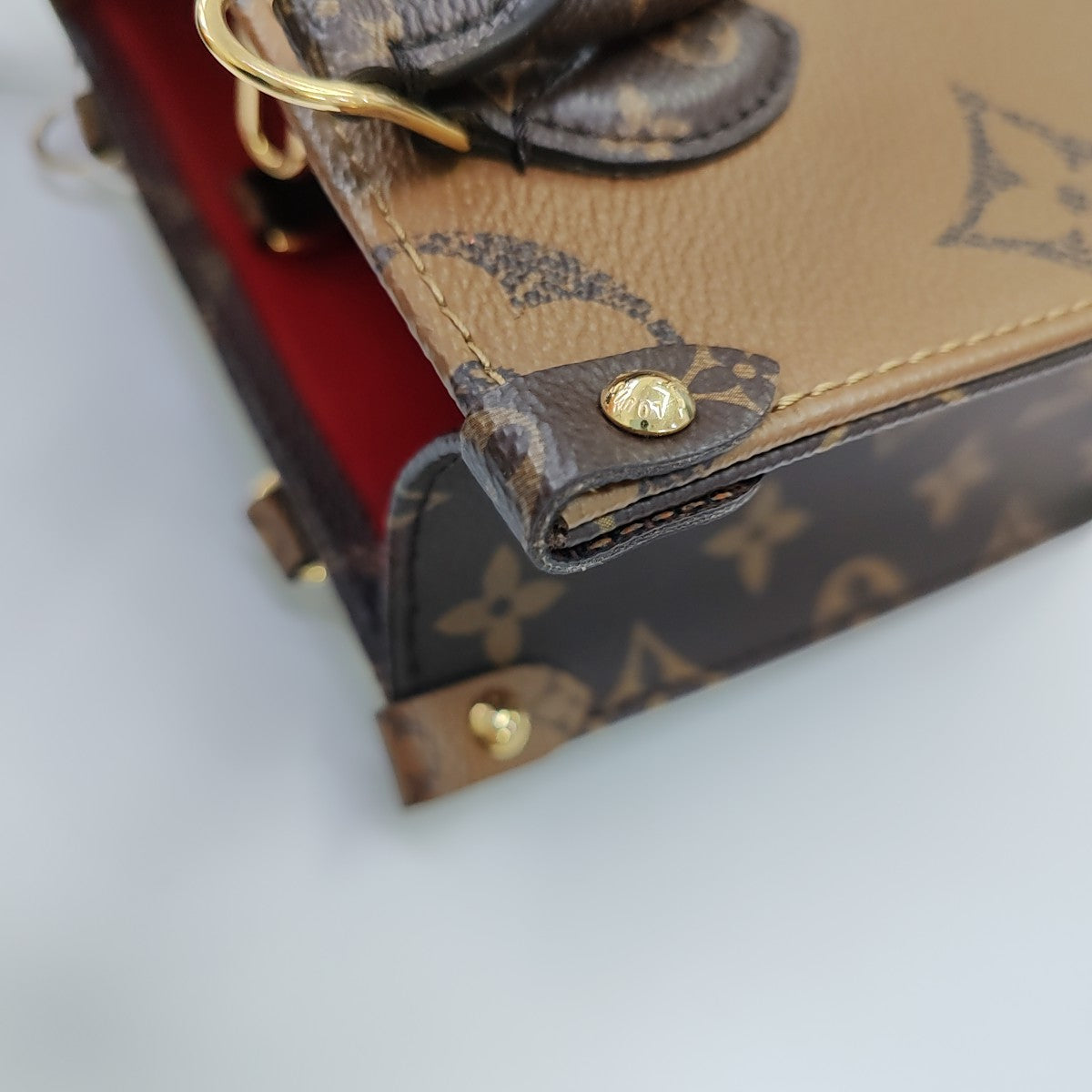 ONTHEGO BB Monogram Coated Canvas Brown