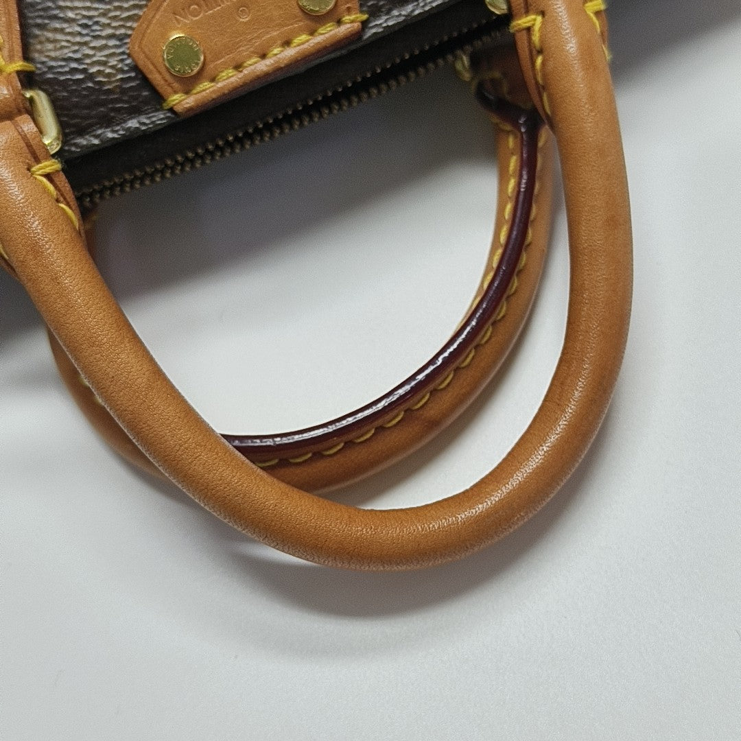 TURENNE Nano Monogram Coated Canvas Brown