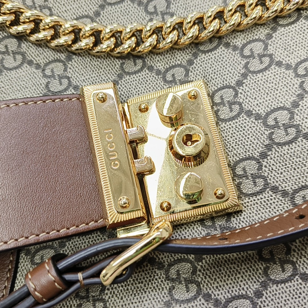 Padlock Medium Monogram Coated Canvas Brown