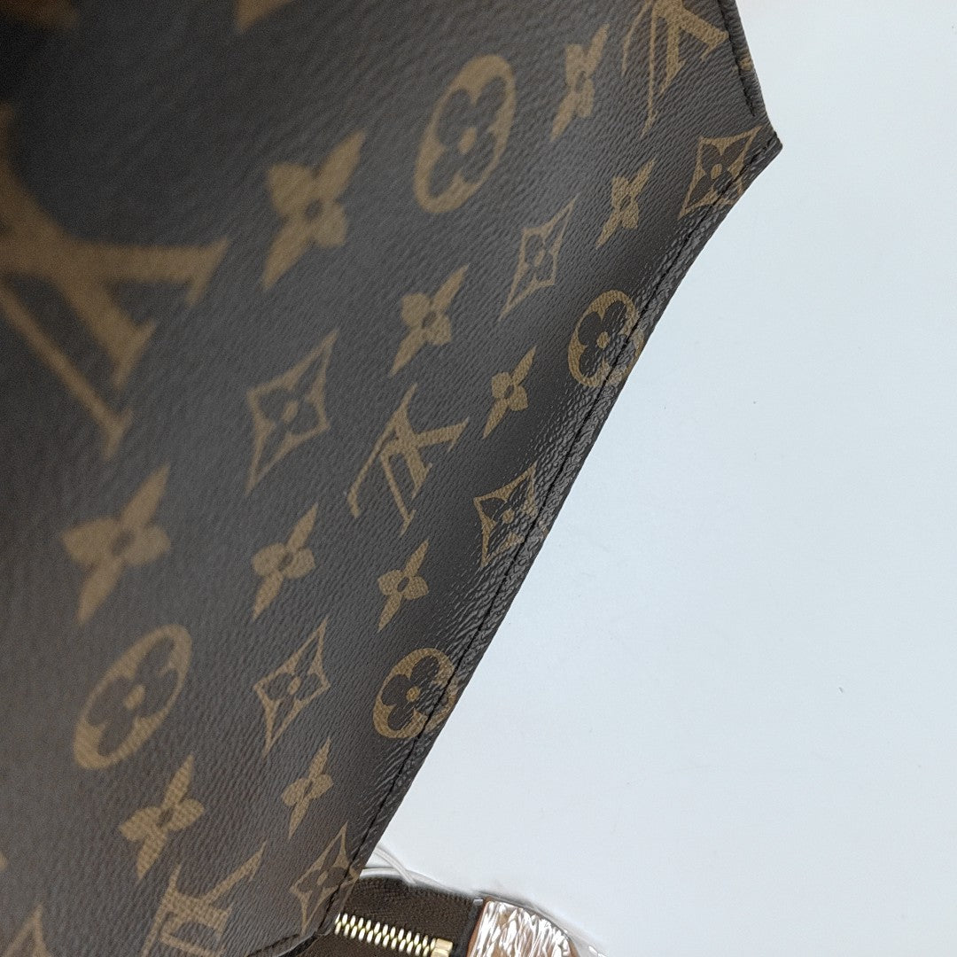 TOILET POCKET 19 Monogram Coated Canvas Brown