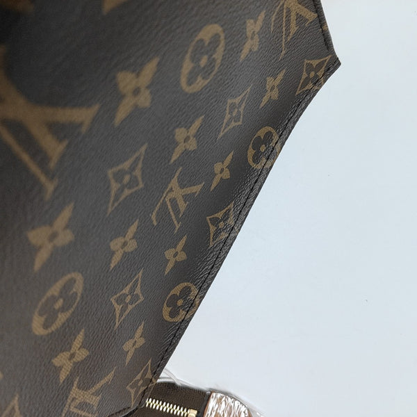 TOILET POCKET 19 Monogram Coated Canvas Brown