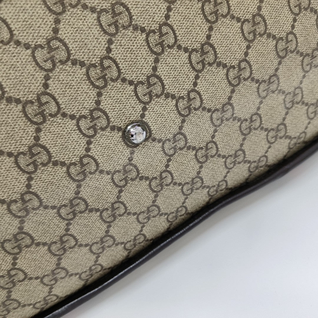 Sherry Monogram Coated Canvas Brown