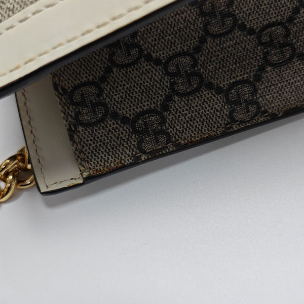 Padlock Small Monogram Coated Canvas Beige