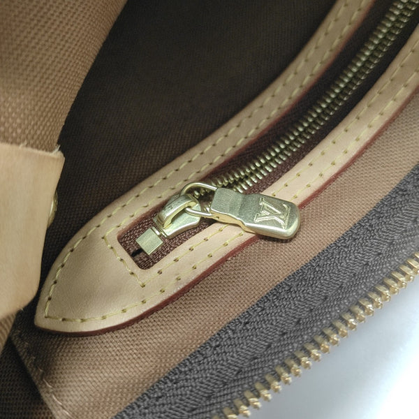 SPEEDY 25 Monogram Coated Canvas Brown