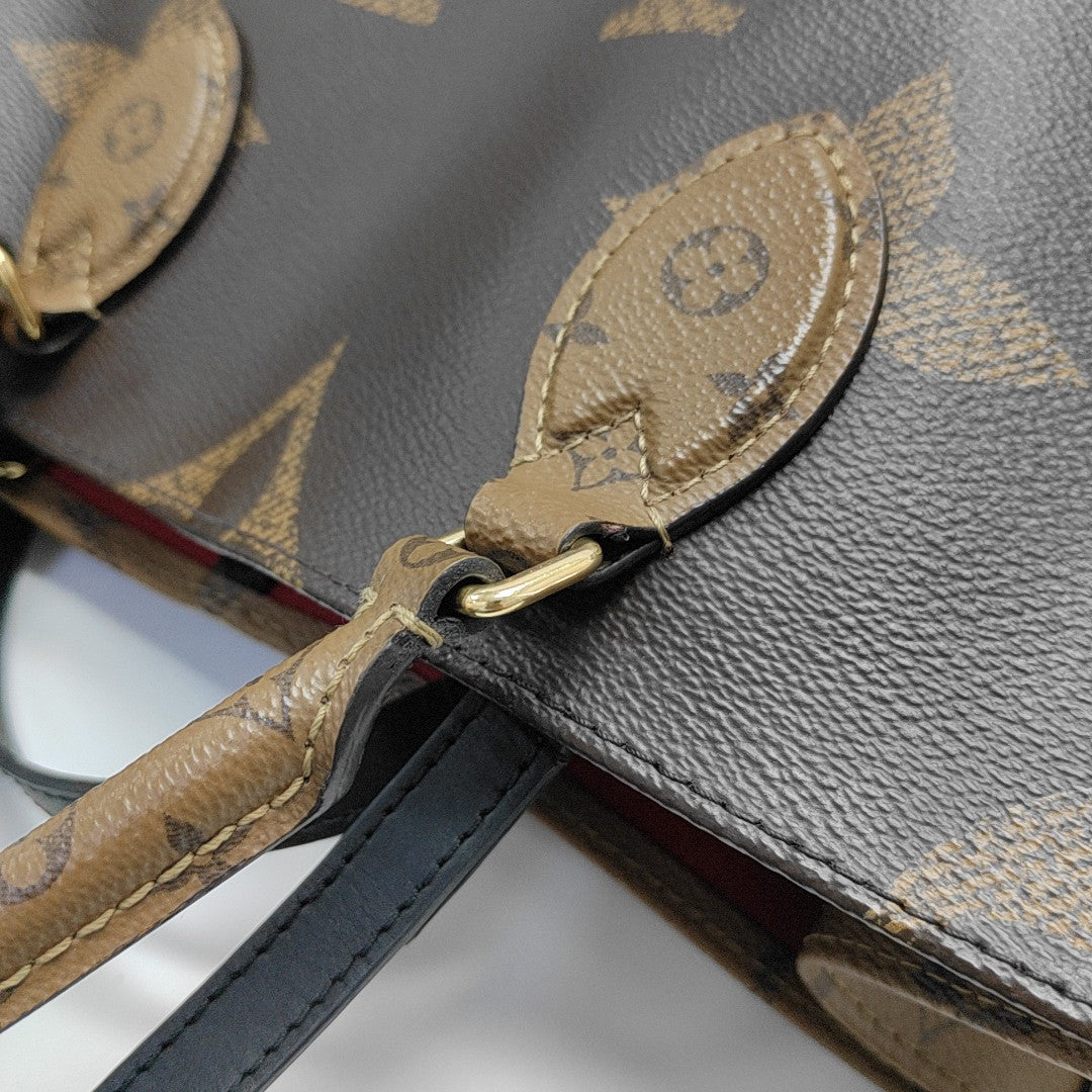 ONTHEGO MM Monogram Coated Canvas Brown