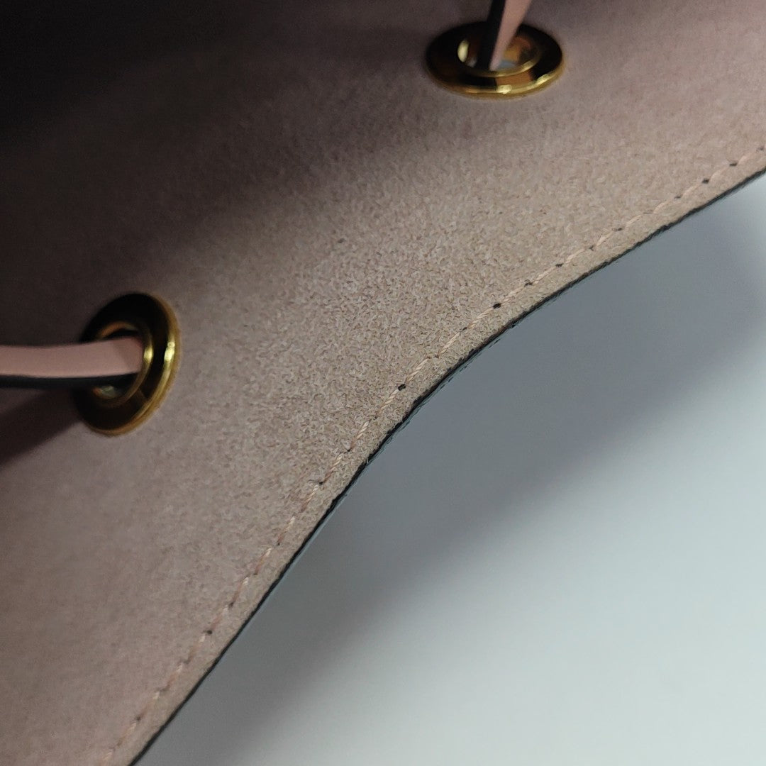 NÉONOÉ MM Monogram Coated Canvas Brown