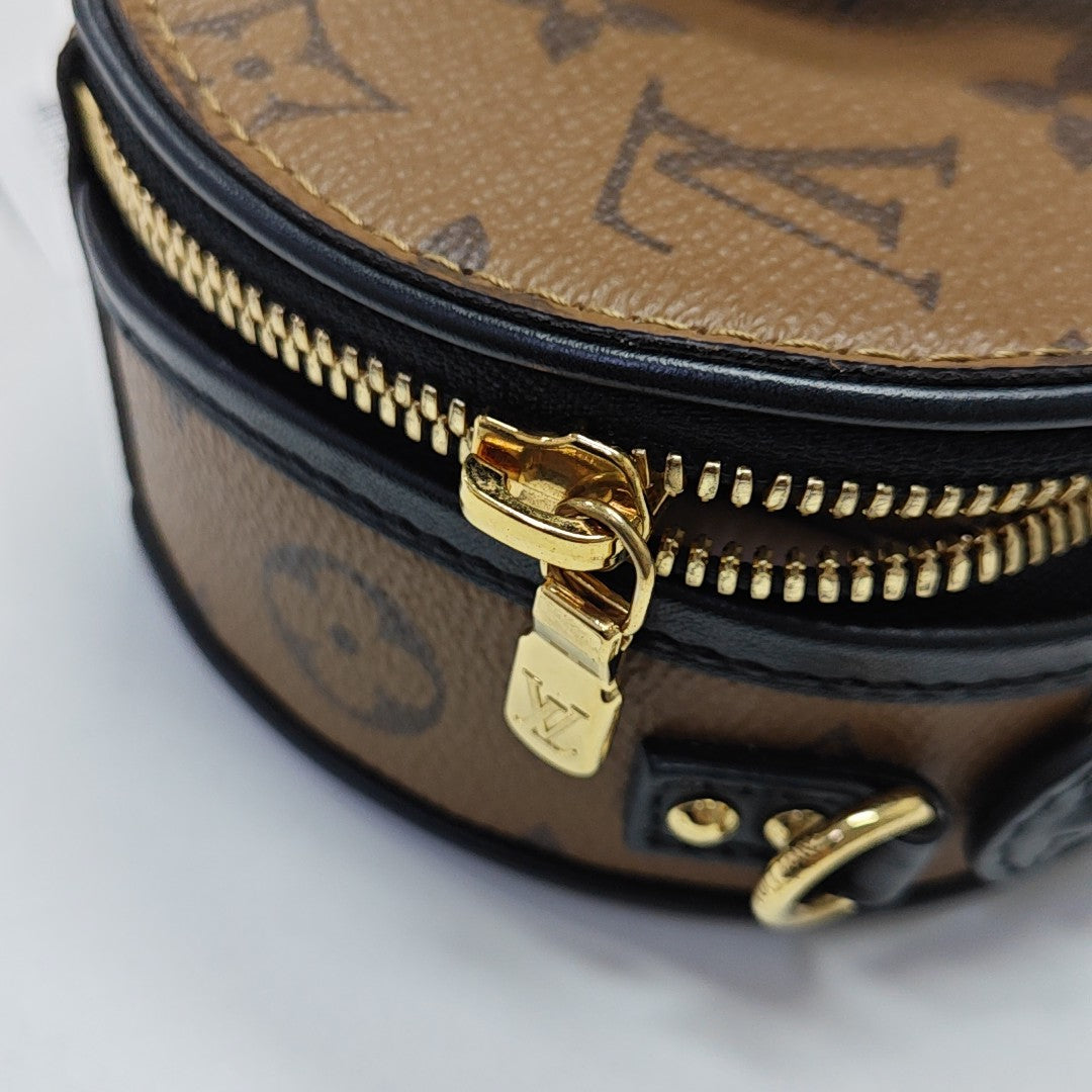 BOITE CHAPEAU Mini Monogram Coated Canvas Brown