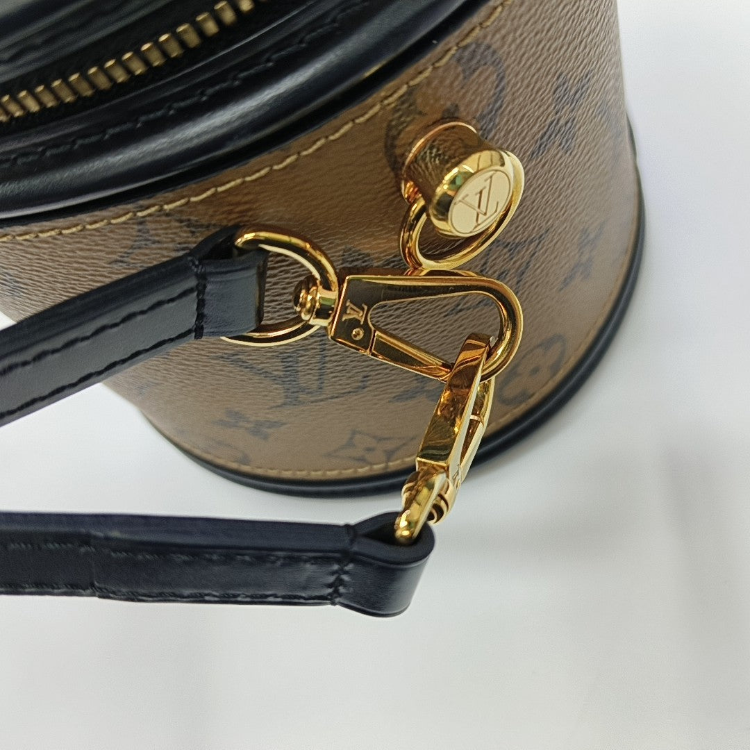CANNES PM Monogram Coated Canvas Brown
