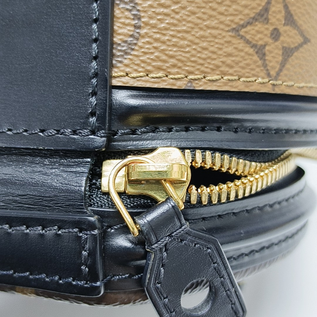 CANNES PM Monogram Coated Canvas Brown