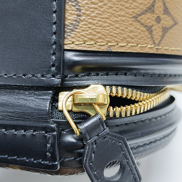 CANNES PM Monogram Coated Canvas Brown