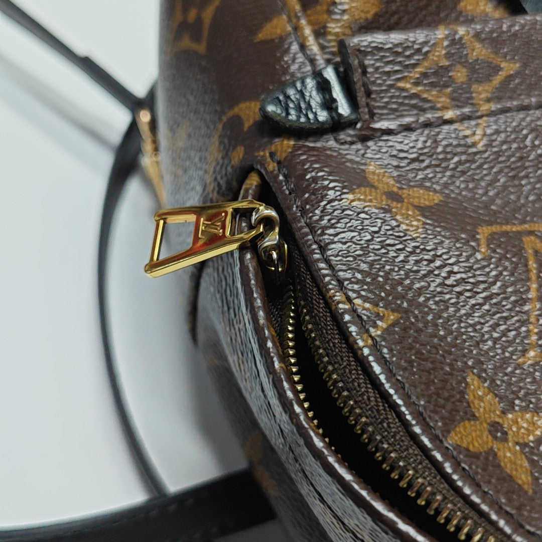 PALM SPRINGS Mini Monogram Coated Canvas Brown