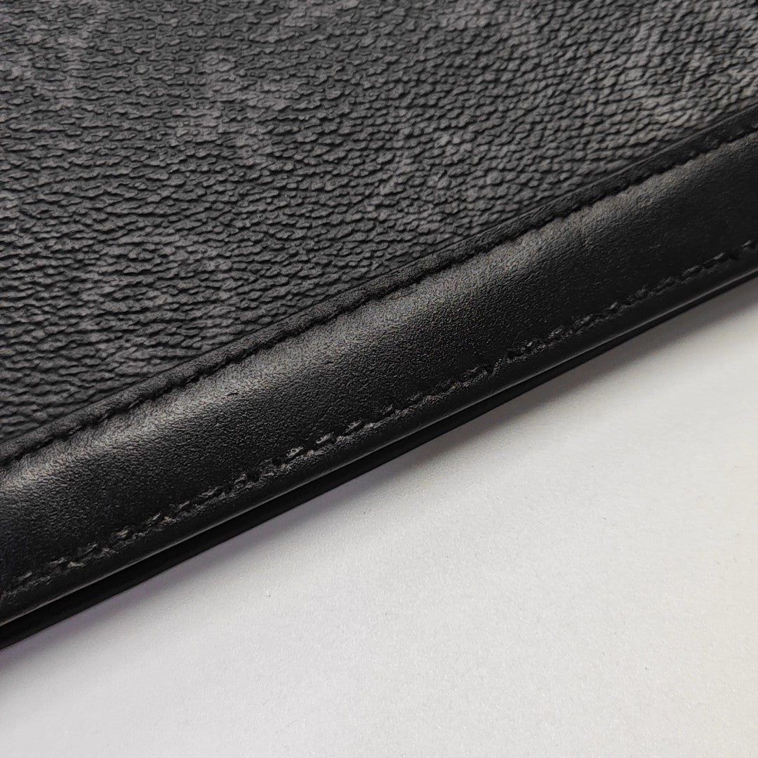 Pochette Voyag MM Monogram Coated Canvas Black