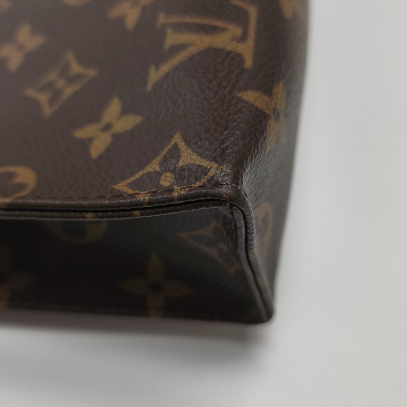 TOILET POCKET 26 Monogram Coated Canvas Brown