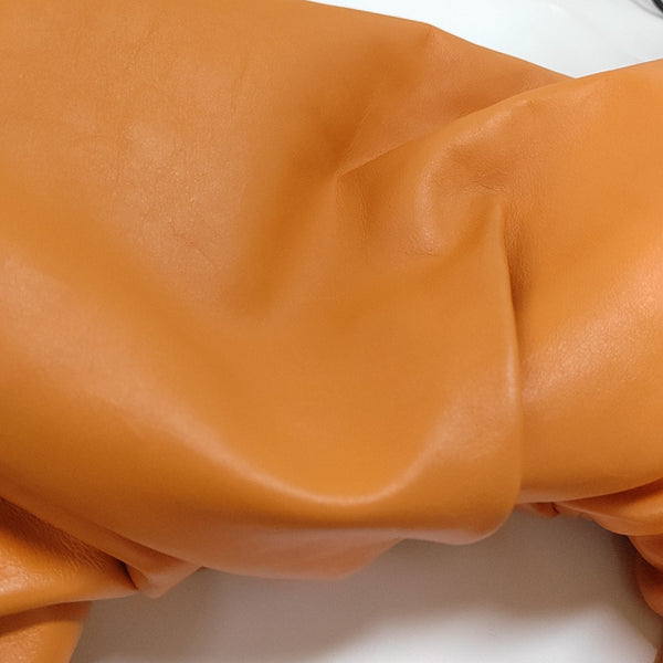 Authenticated pre-owned  The Pouch Calfskin Orange - Top Handle Bag at Looply