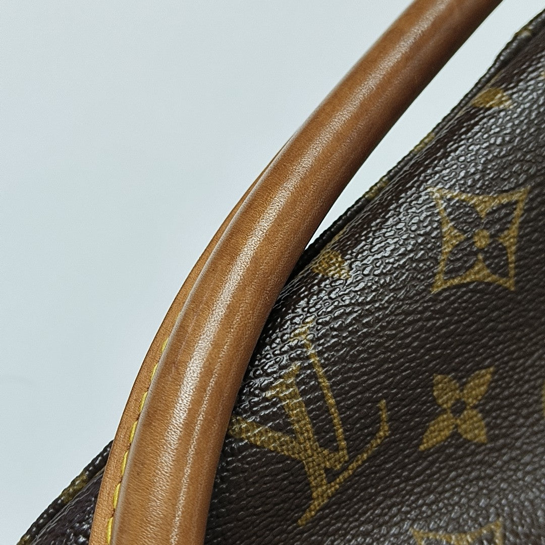 LOOPING PM Monogram Coated Canvas Brown