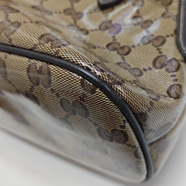 Dome Monogram Coated Canvas Brown