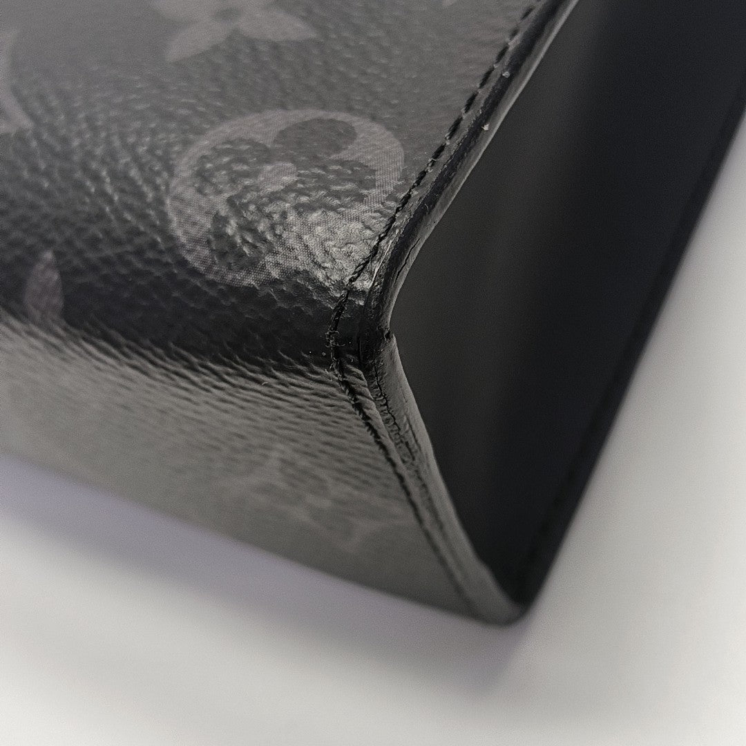 Pochette Voyag MM Monogram Coated Canvas Black