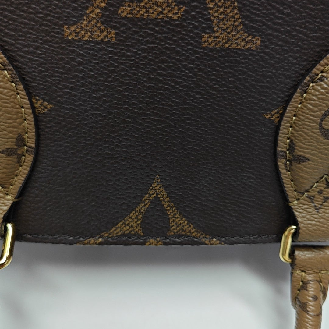 ONTHEGO PM Monogram Coated Canvas Brown