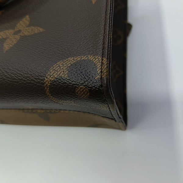 ONTHEGO PM Monogram Coated Canvas Brown