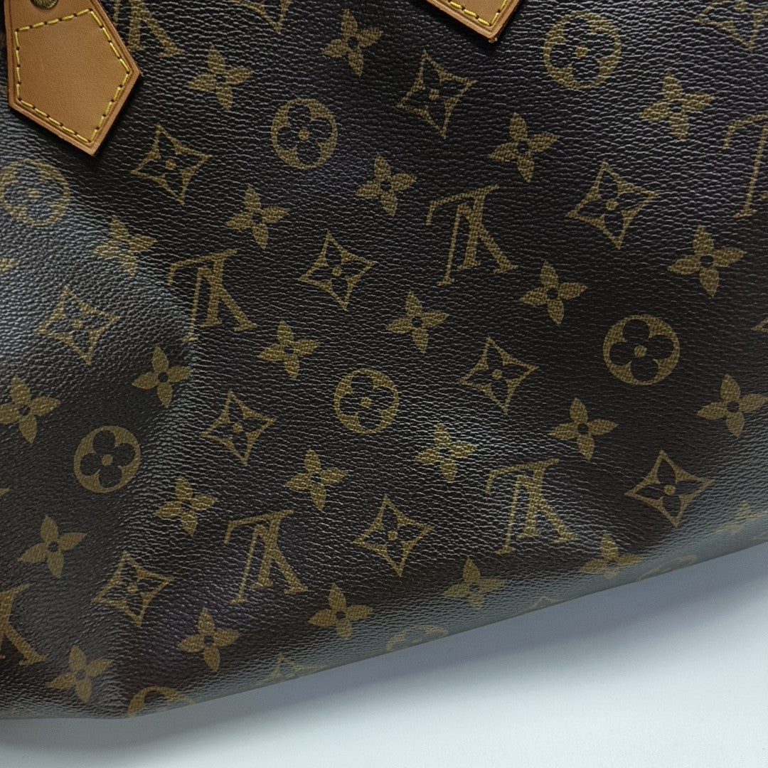 SPEEDY 35 Monogram Coated Canvas Brown