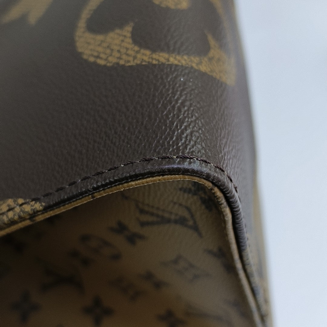 ONTHEGO GM Monogram Coated Canvas Brown