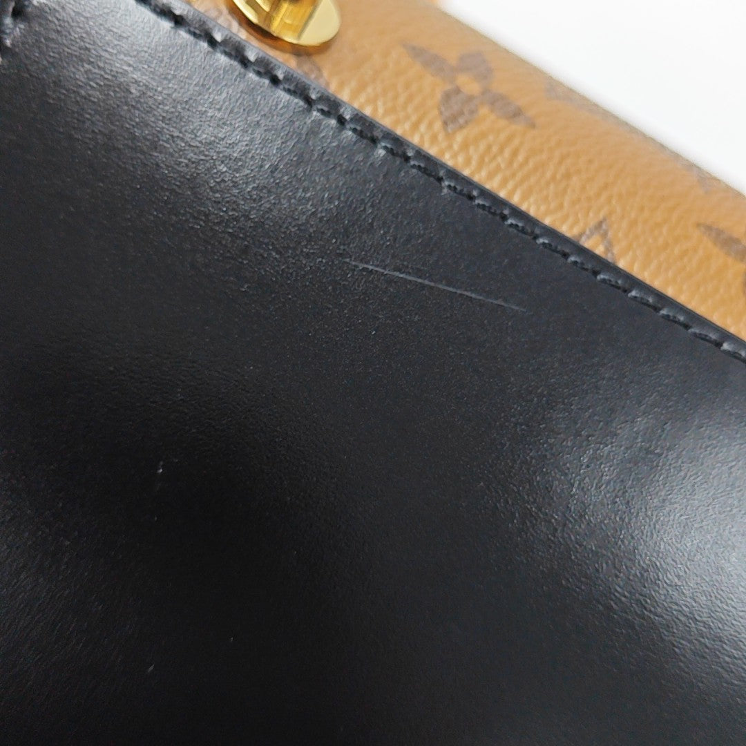 CANNES PM Monogram Coated Canvas Brown