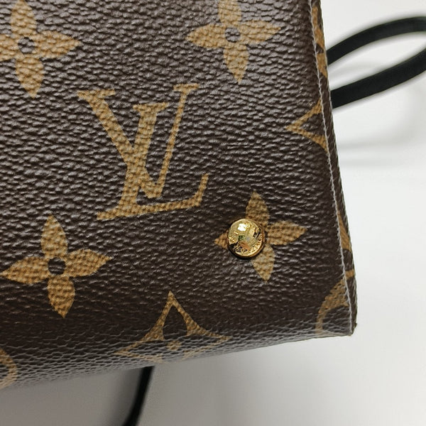 TOBALLALA Monogram Coated Canvas Brown