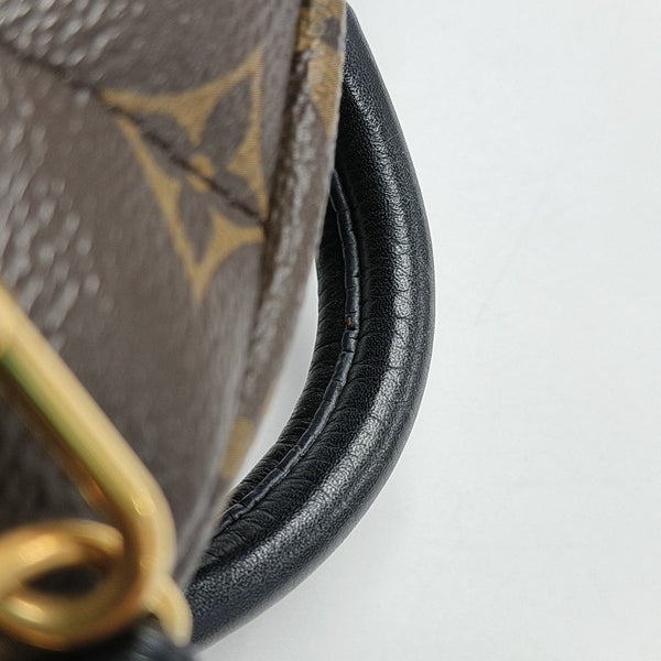 PALM SPRINGS Mini Monogram Coated Canvas Brown
