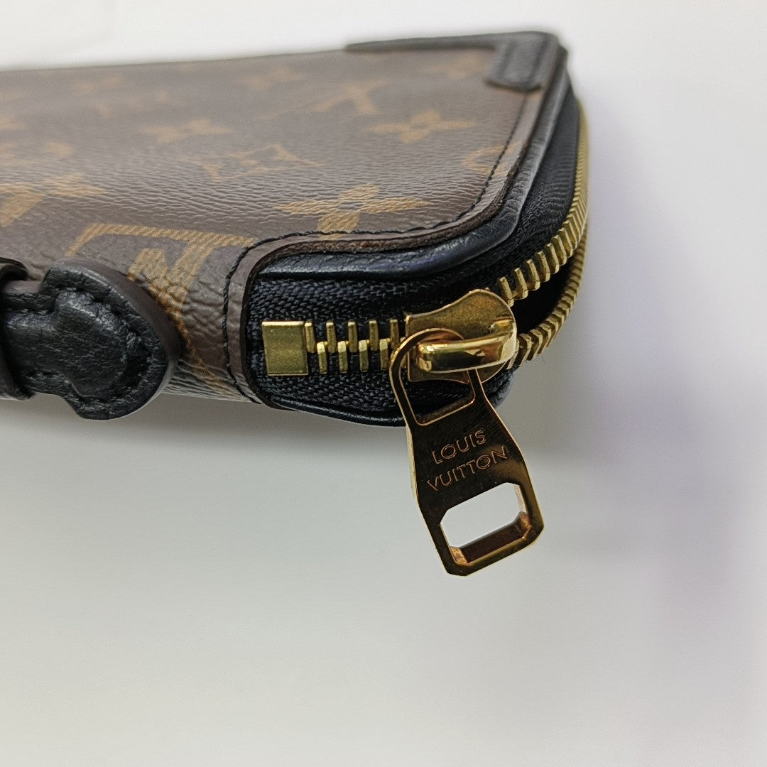 Monogram Coated Canvas Clutch Brown