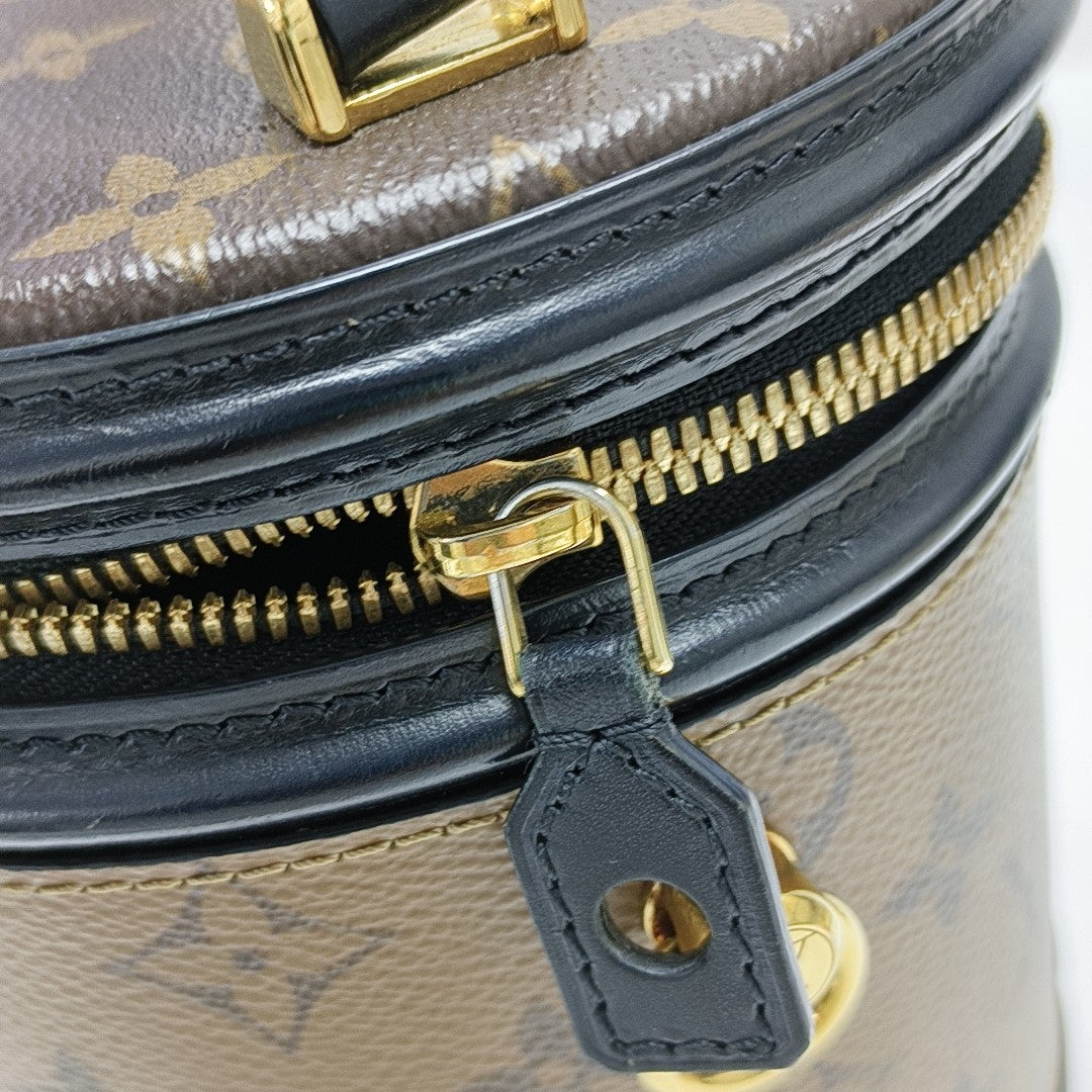 CANNES PM Monogram Coated Canvas Brown